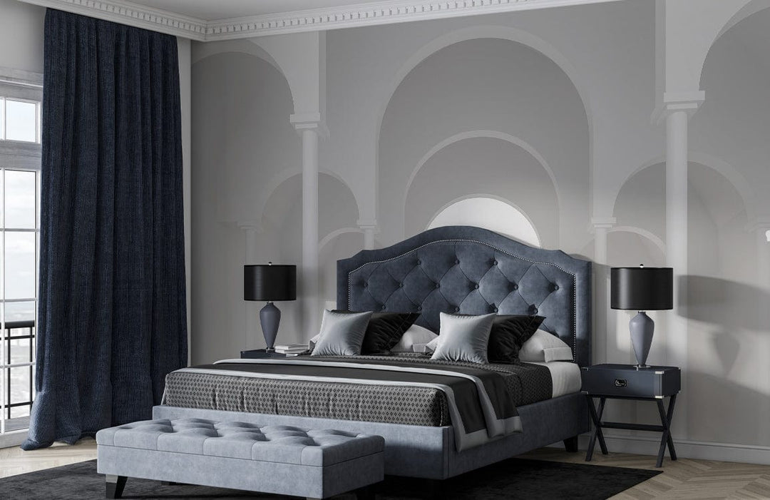 Elegant white archway mural in modern bedroom with grey bed, dark curtains, and parquet flooring.