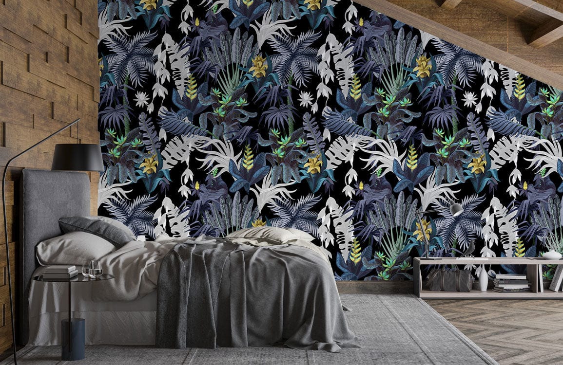 Rustic bedroom with dark botanical jungle pattern wallpaper in blue-green shades, grey bed, wooden accents.