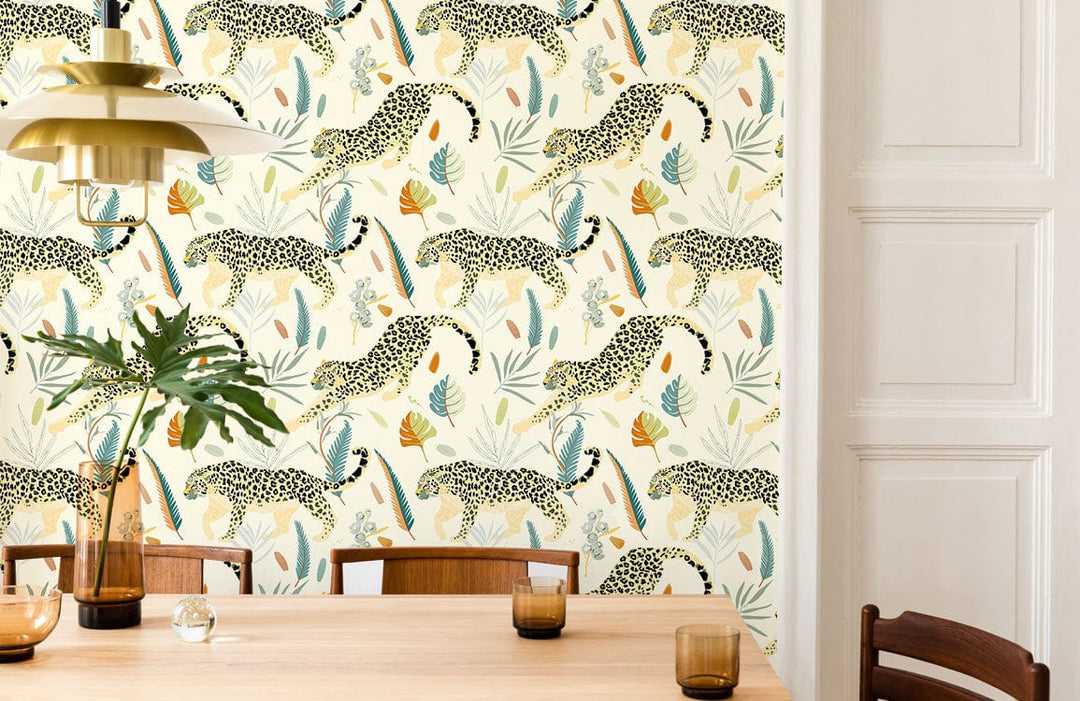 Elegant Jungle Leopard Print Wallpaper with tropical leaves, dining room, white wall panelling, wood dining table.