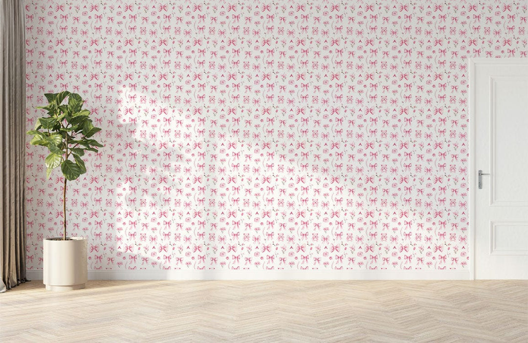 Pink berry blossom wallpaper, floral design, white door, herringbone flooring, green potted plant.