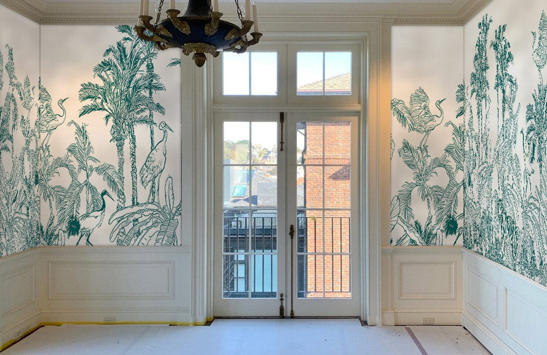 Tropical Safari Green Jungle Mural Wallpaper with exotic wildlife in elegant room, decorative chandelier.