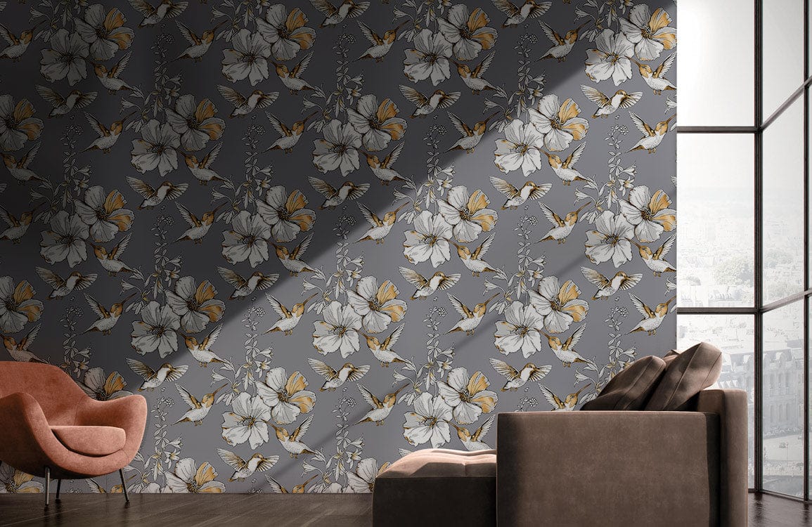 Elegant grey floral wallpaper with butterflies, modern botanical design, brown sofa, pink chair, wooden floor.