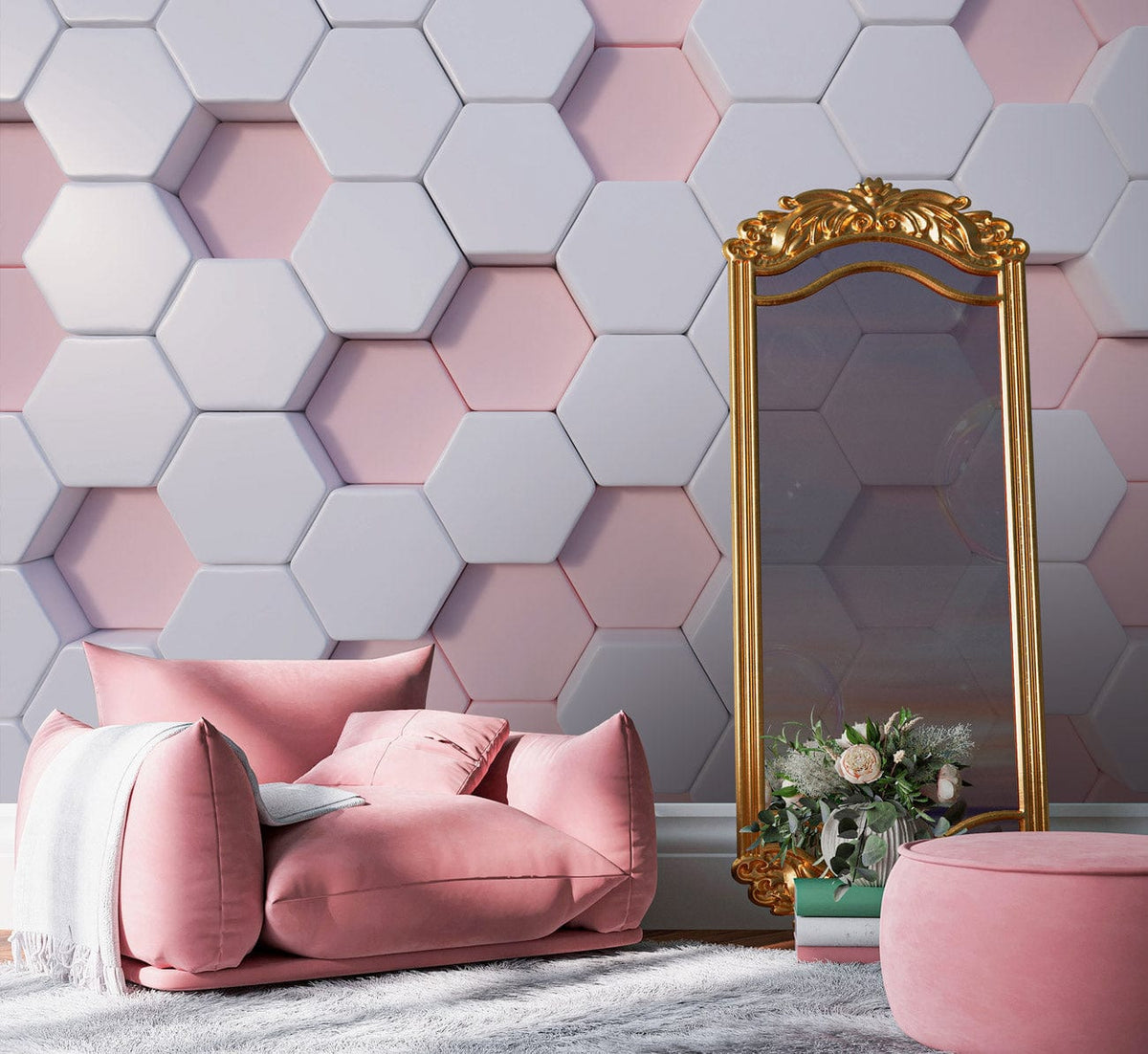 Modern hexagonal blush and white geometric wallpaper in a living room with pink sofa and mirror.
