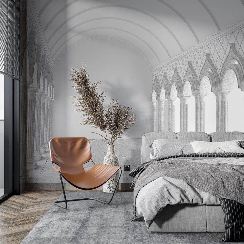 Gothic archway wallpaper, monochrome grey tones, modern bedroom, grey bed, stylish brown chair, contemporary.