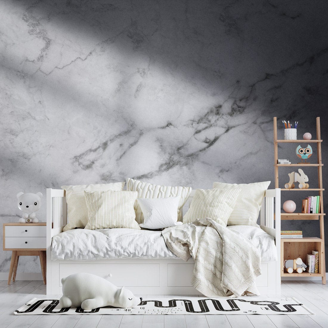 Elegantly modern white marble effect wallpaper with light grey sofa bed and minimalistic wooden furniture.