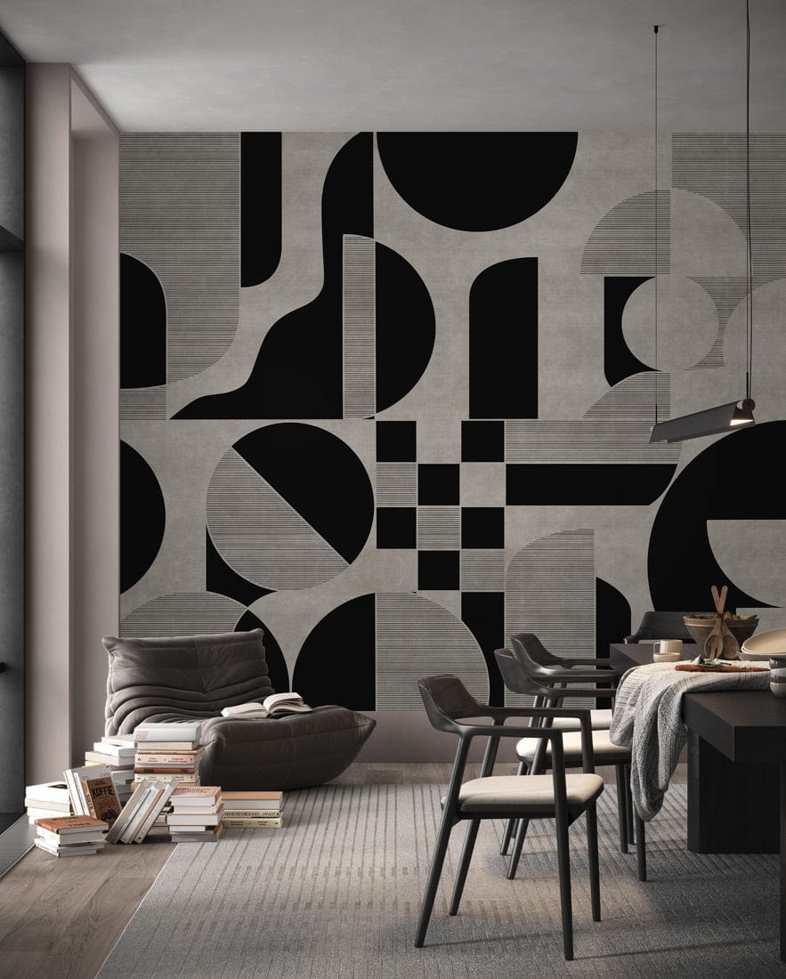 Geometric grey and black abstract patterned wallpaper in modern dining room with grey flooring and chairs.