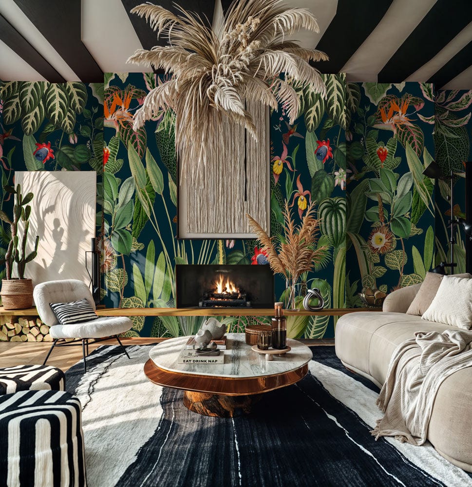 Tropical Jungle Oasis wallpaper behind beige sofa, wood table, fireplace; botanical living room decor.