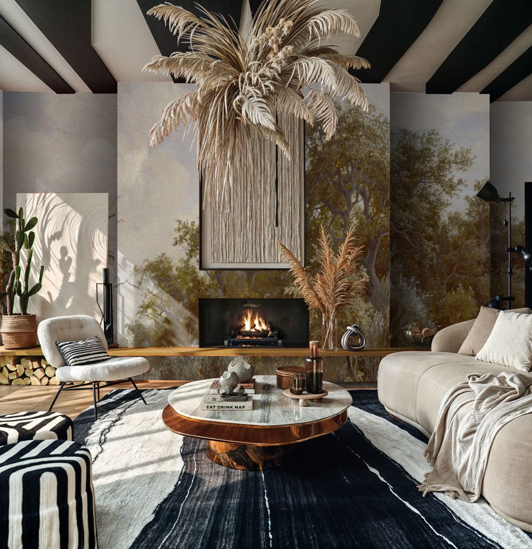 Elegant mural wallpaper with vintage woodland scene in living room, beige sofa, striped rug, and fireplace.