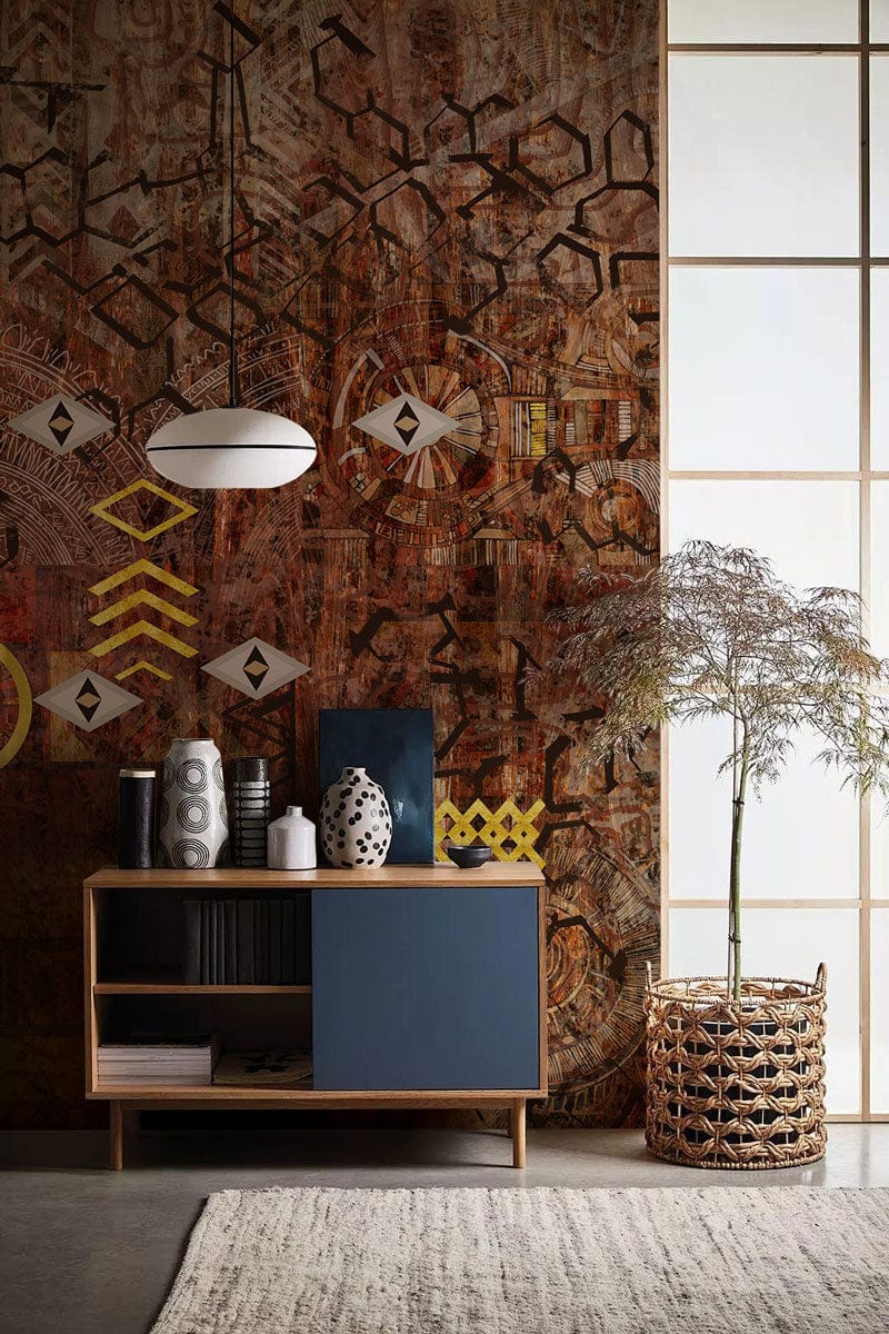 Rustic Geometric Tribal Pattern Mural Wallpaper in warm tones, mid-century cabinet, soft grey rug, modern decor.