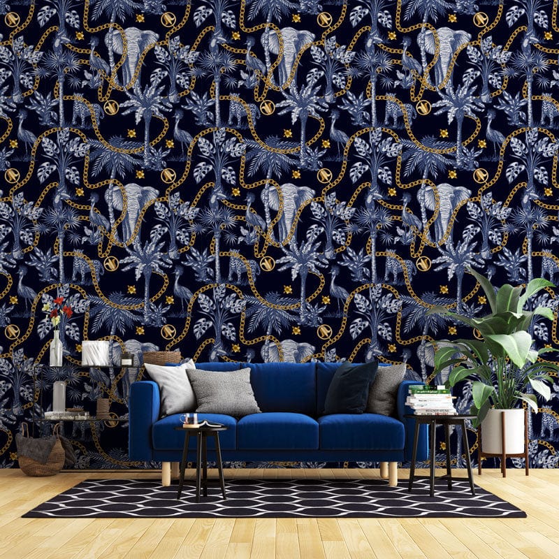 Elegant blue elephant jungle wallpaper with golden accents in modern living room, blue sofa, wood flooring.