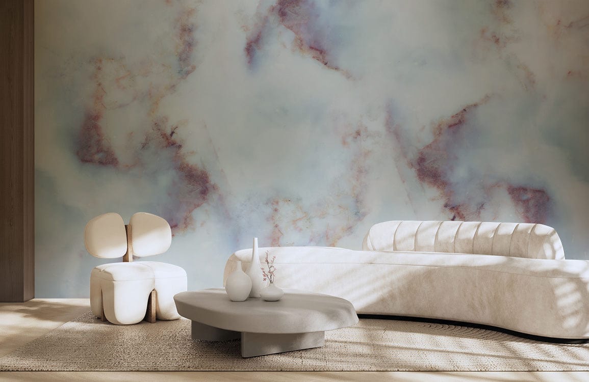 Abstract watercolour marble effect mural wallpaper with ivory sofa, modern chair, and beige rug in lounge.