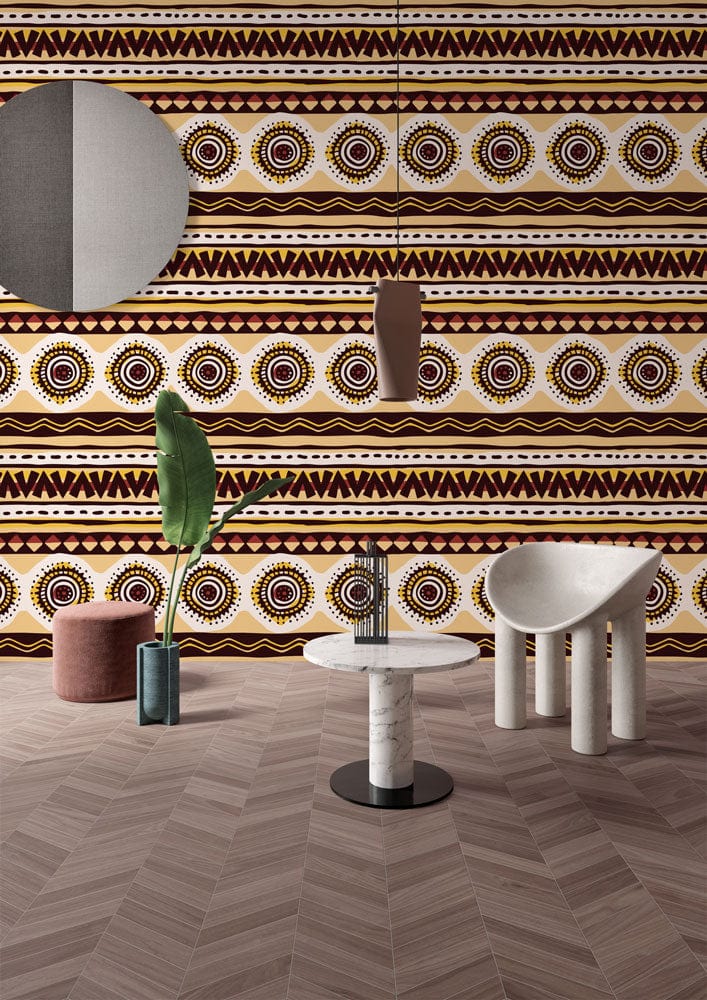 Tribal Geometric Brown Cream Wallpaper with Modern Furniture, Chevron Flooring, and Mirror in Contemporary Room.