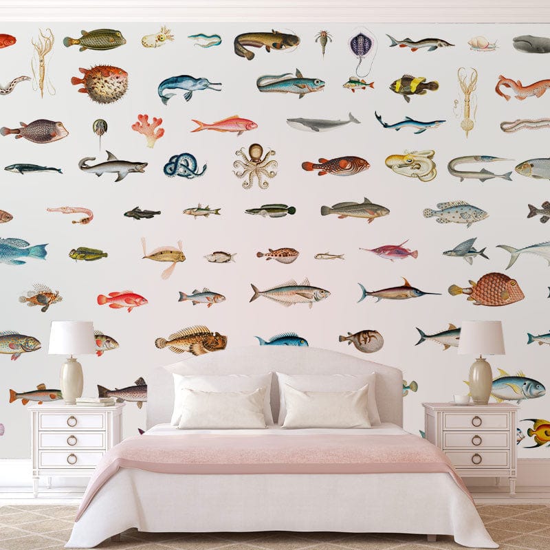 Colourful marine life wallpaper with exotic fish, beige sofa, white room, bedside tables, classic lamps.