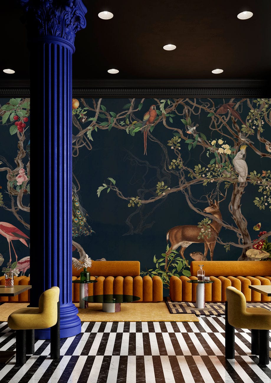 Exotic Wildlife Scene Mural Wallpaper in dark green, mustard sofas, striped flooring, vibrant interior design.