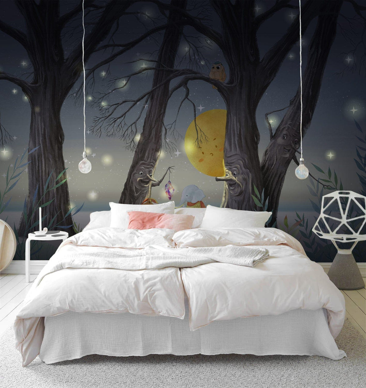 Enchanted Woodland Creatures Mural Wallpaper in bedroom, white bed, pendant lights, geometric lamp, wooden flooring.