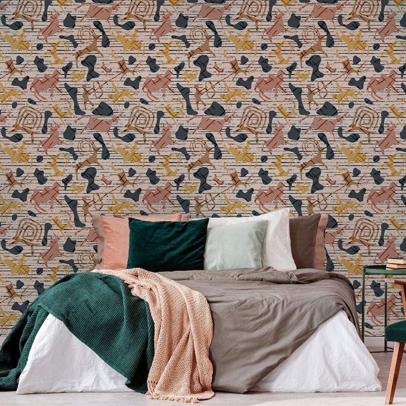 Abstract geometric wallpaper in bedroom with elegant grey bedding and vibrant, multi-coloured design.