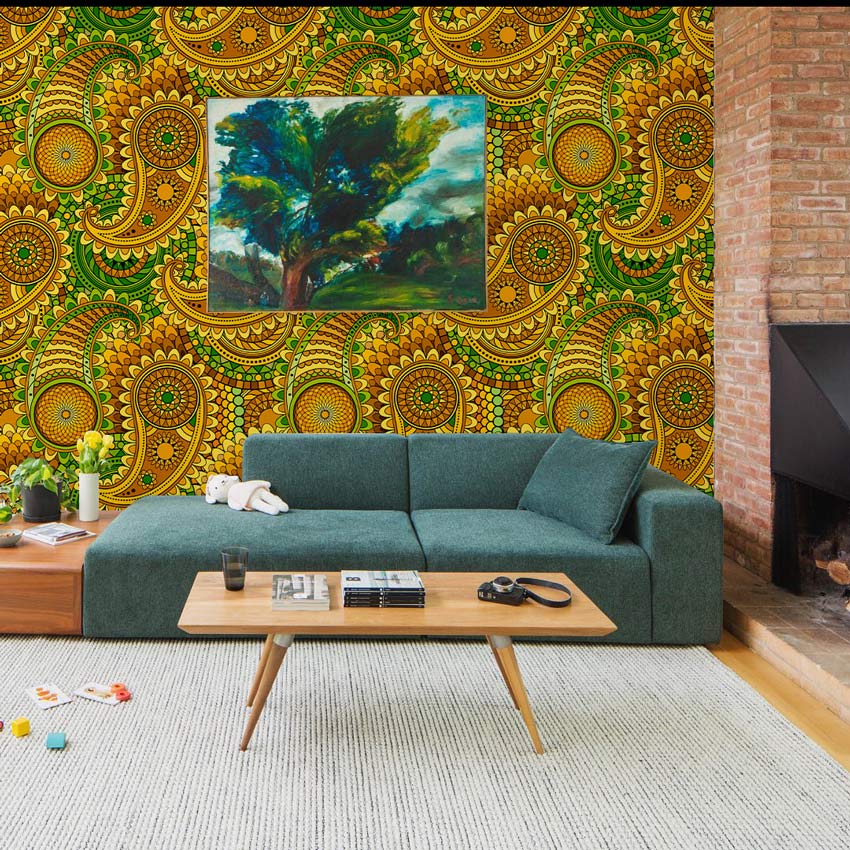Vibrant Green and Gold Paisley Wallpaper with Boho Sofa, Rug, Brick Fireplace in Cosy Living Room.