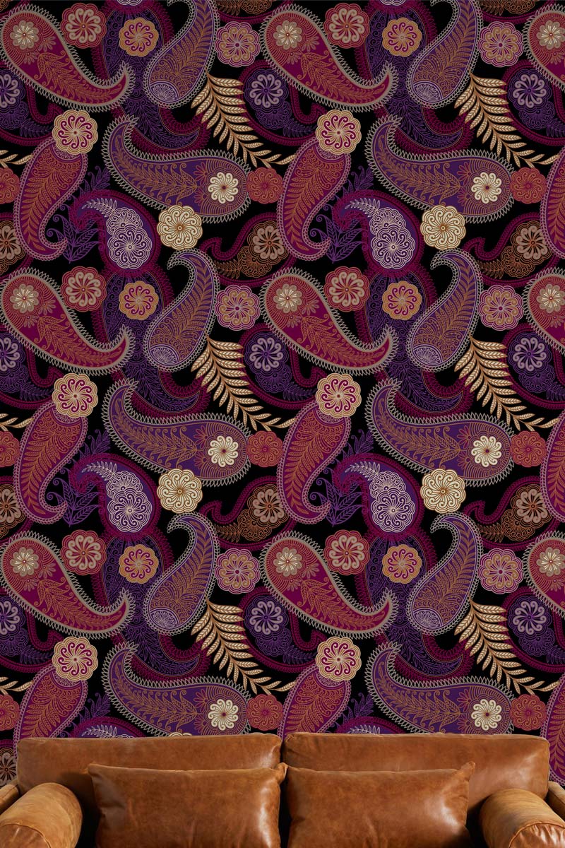 Brown leather sofa complements the vintage paisley wallpaper in rich red and gold hues design.