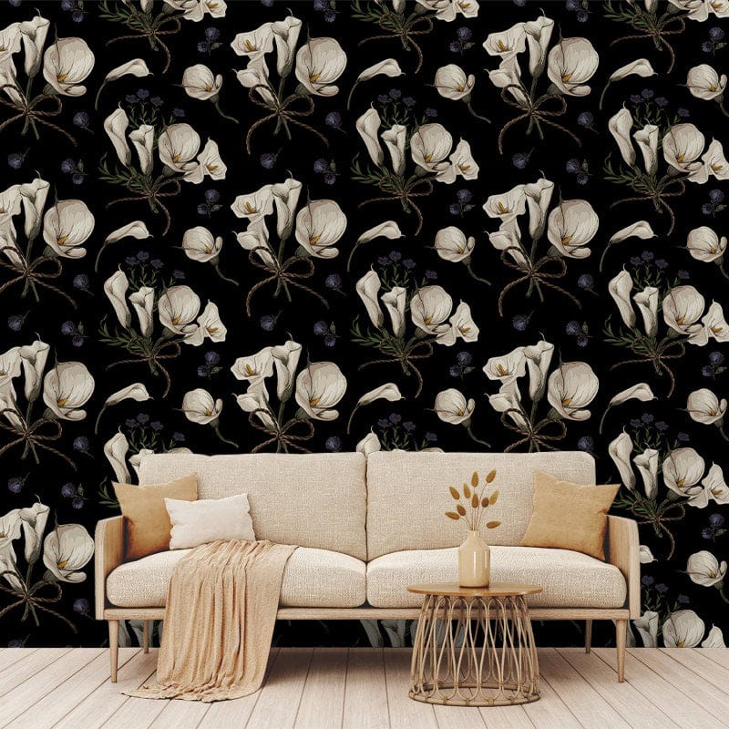 Elegant vintage floral wallpaper with white lilies, beige sofa, wooden flooring, living room setting.