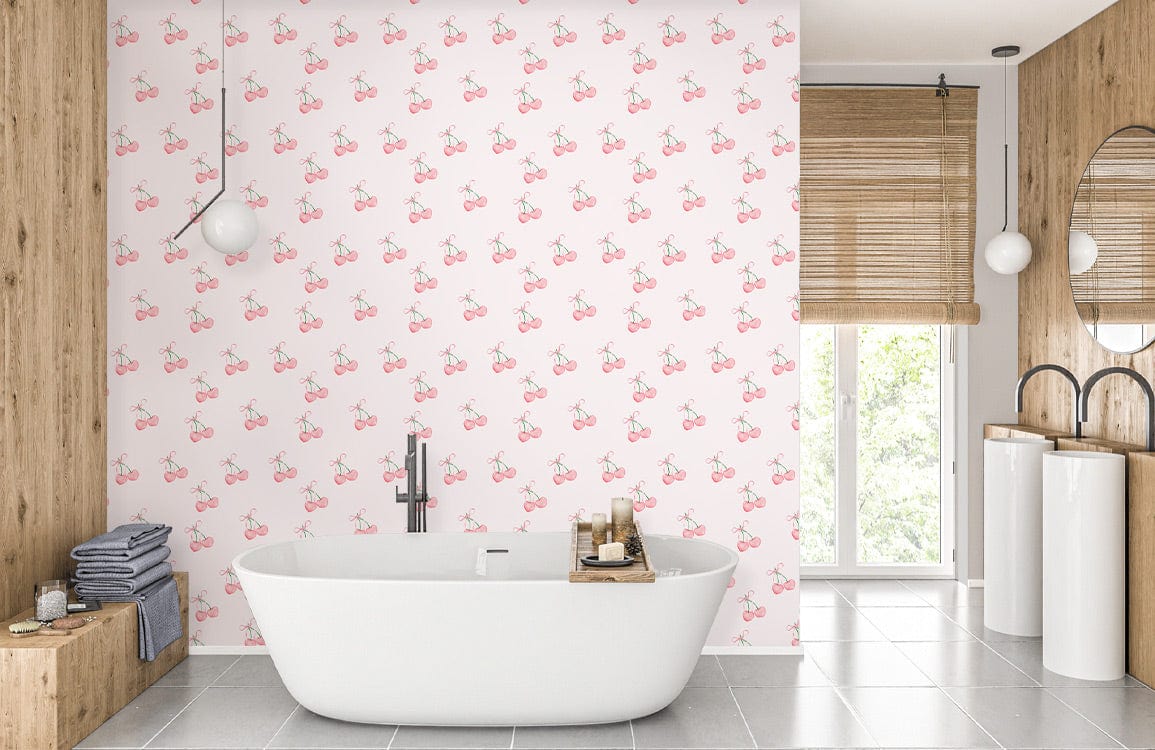 Vintage pink cherry wallpaper in modern bathroom, white bathtub, wooden accents, round mirror, light tiles.