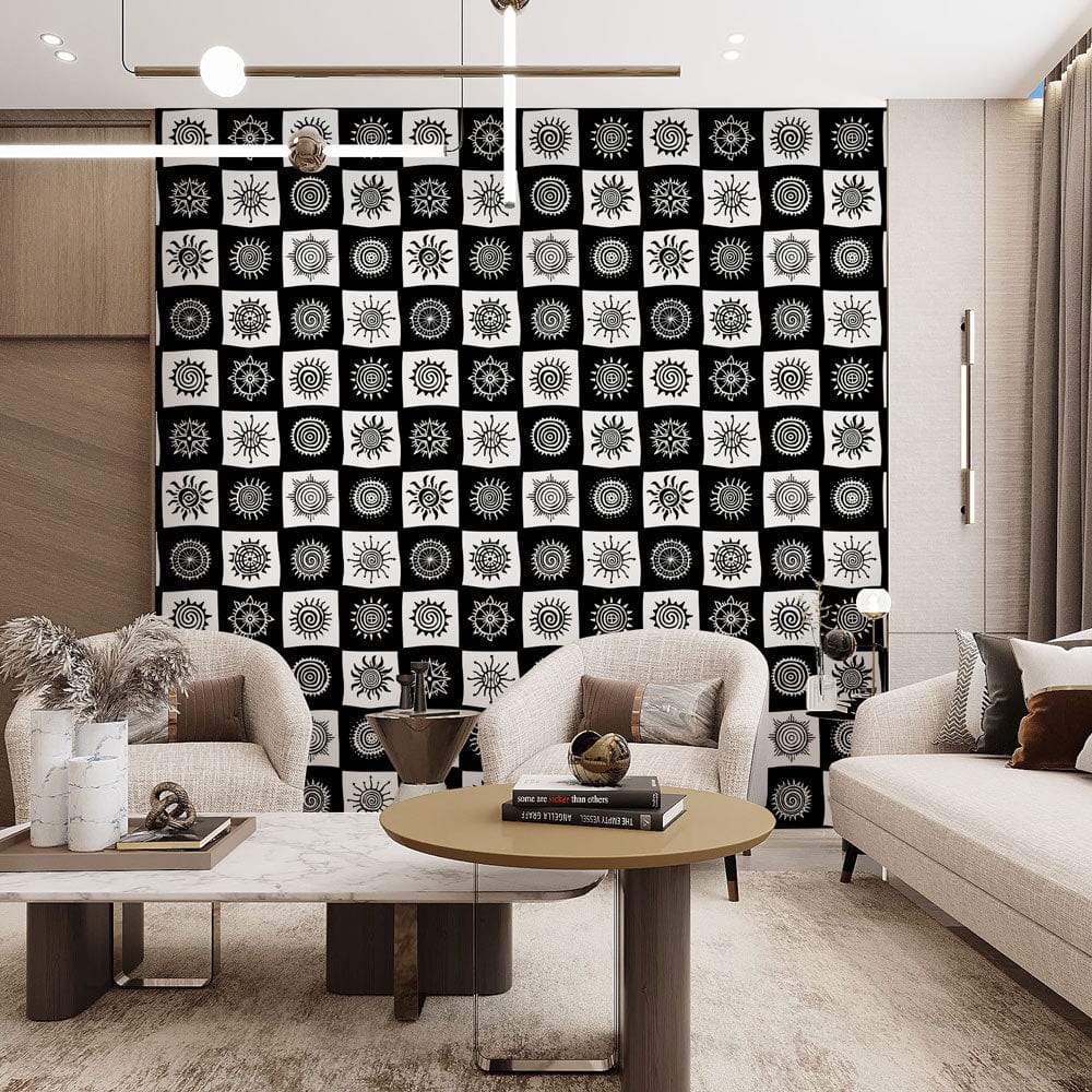 Monochrome geometric patterned wallpaper in modern living room with neutral sofas and wooden coffee table.