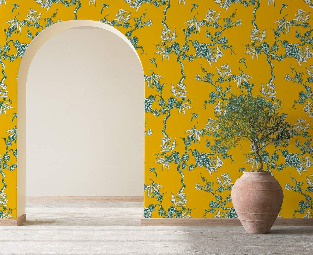 Vintage mustard floral wallpaper with green accents, elegant archway, terracotta vase in stylish room.