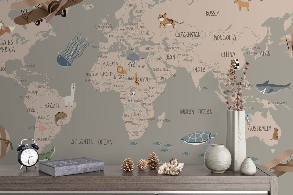 Vintage world map wallpaper in taupe tones with aeroplanes, animals; displayed above modern wooden console.