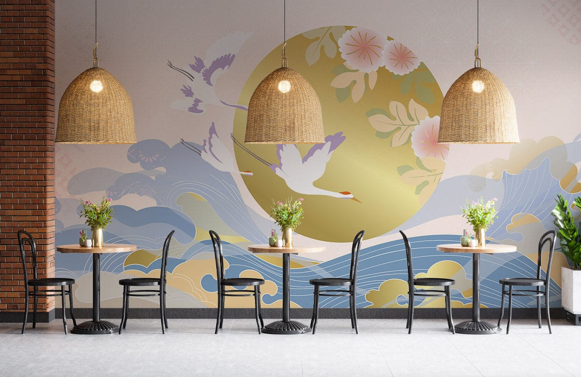 Elegant Oriental Birds and Waves Wallpaper in pastel, gold hues with wicker lamps in a stylish café.