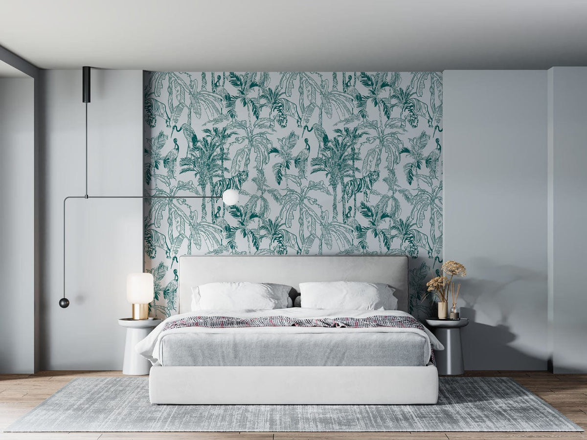 Tropical Oasis green jungle pattern mural wallpaper, grey modern bed, light grey rug, wooden flooring.