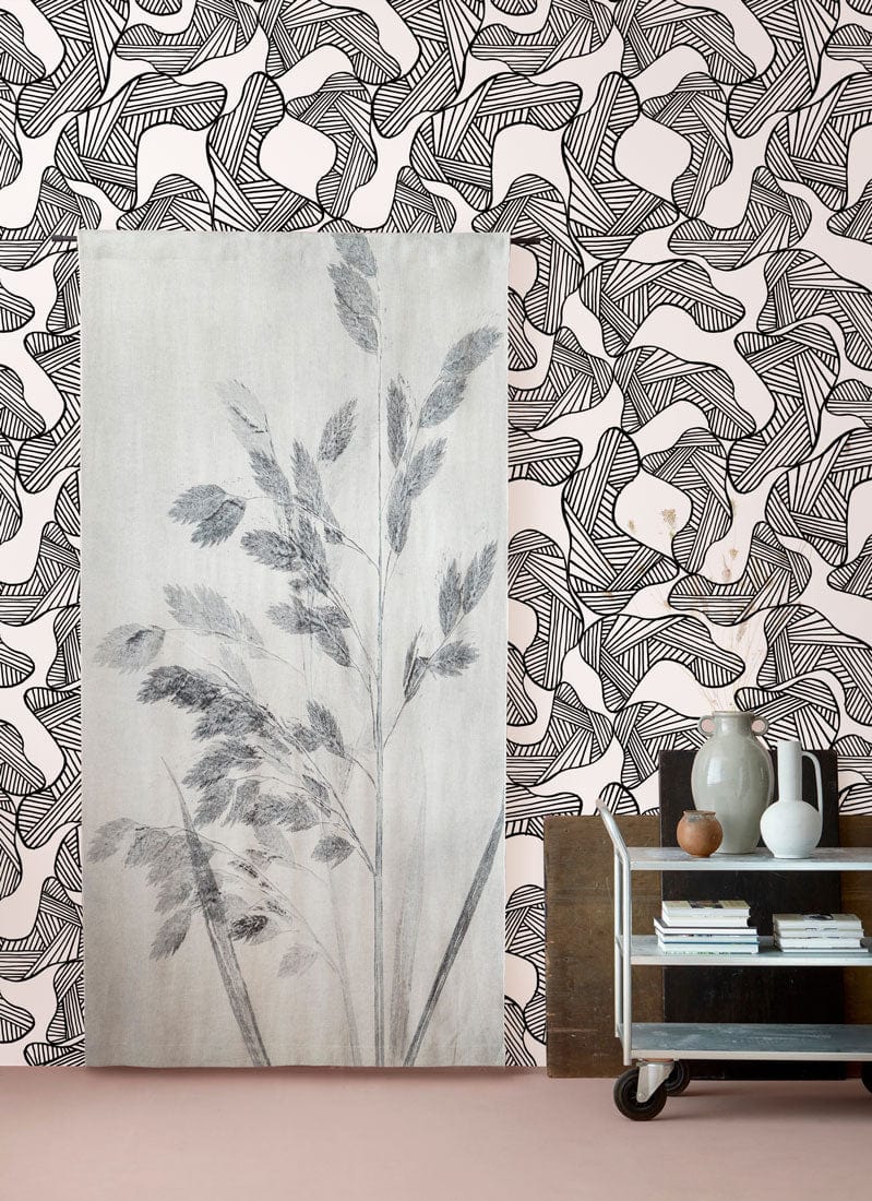 Monochrome abstract line art wallpaper in modern room with vintage trolley, neutral tones, contemporary decor.
