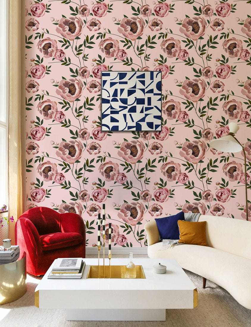 Vintage floral wallpaper in pink and green, red chair, contemporary white sofa, patterned artwork, modern room.