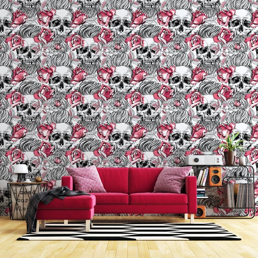 Black and White Skull Tattoo Art Wallpaper with Red Roses; red sofa, wooden flooring, zigzag rug.