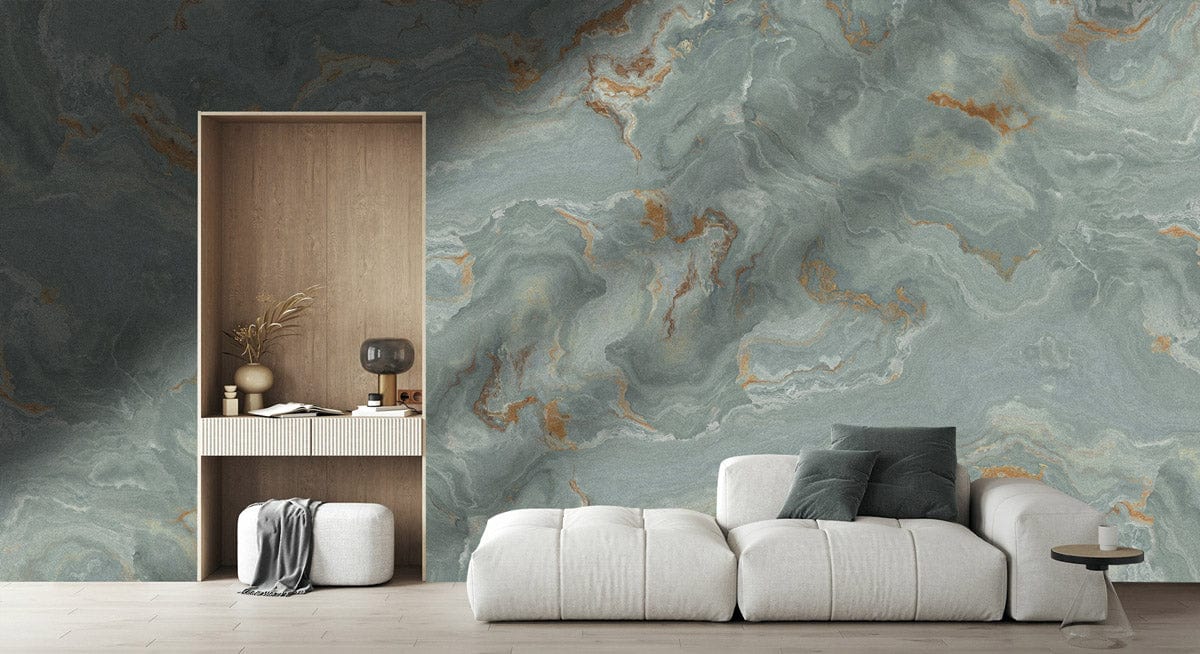 Marble effect wallpaper mural in sage and rust with modern cream sofa and wooden shelving unit.
