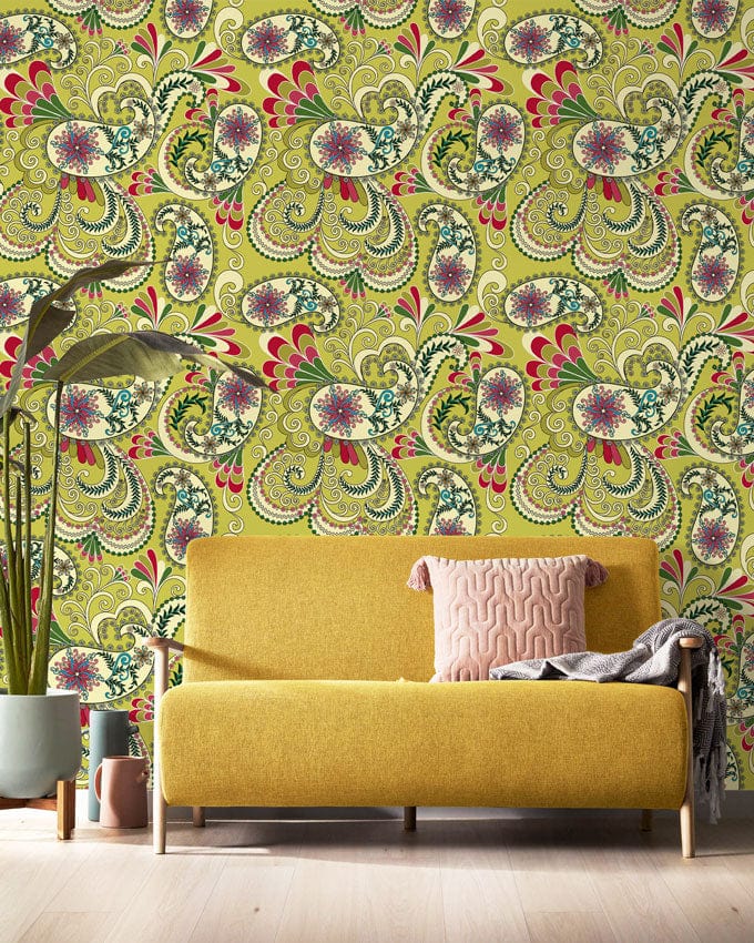Vintage Floral Paisley Wallpaper in green, red. Yellow sofa, light flooring enhance retro chic decor.