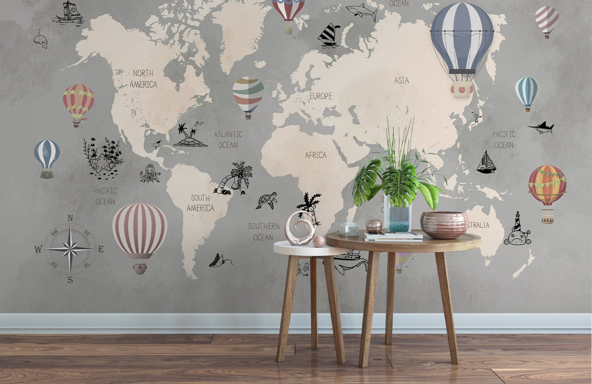 Vintage Adventure World Map Mural Wallpaper with pastel balloons in living room, wood floor, minimalist decor.