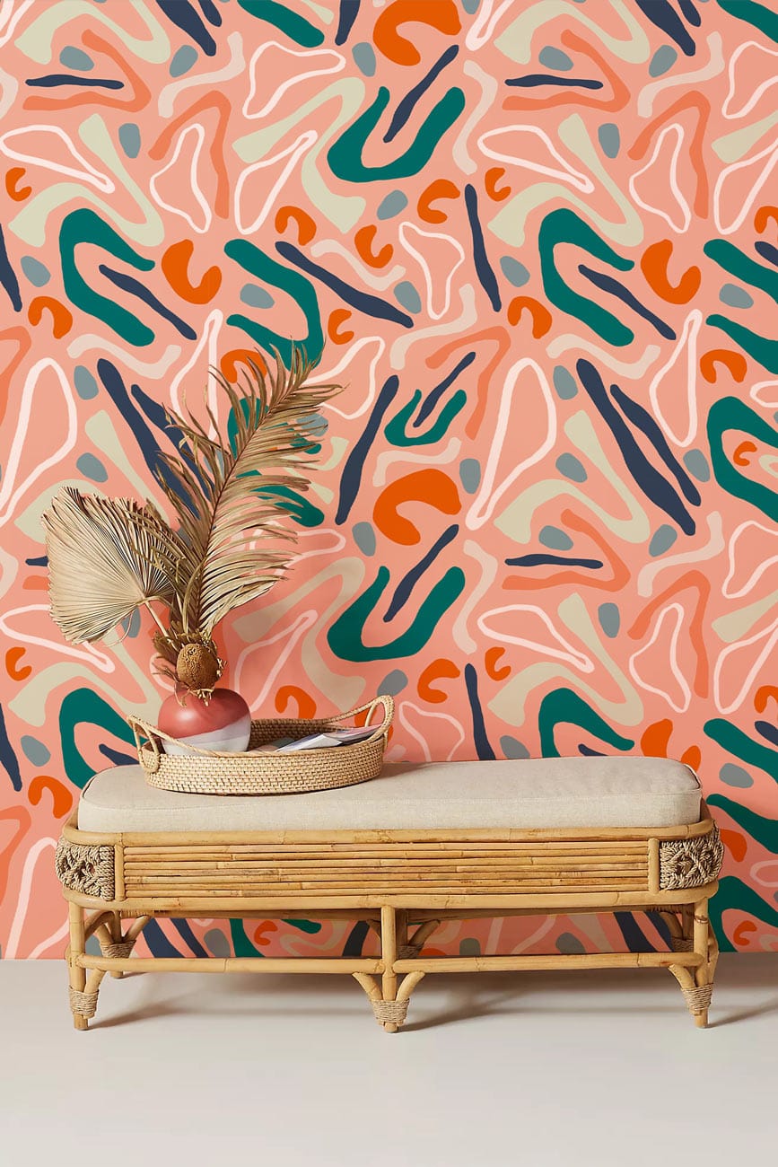 Abstract Terracotta and Teal Modern Wallpaper, rattan bench, neutral flooring, artistic decor.
