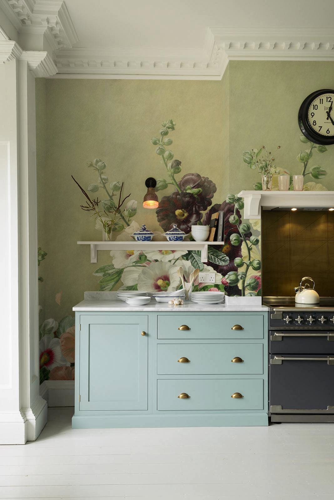 Elegant Floral Garden Mural Wallpaper complements vintage kitchen with pastel cabinets, modern cooker, and wall clock.