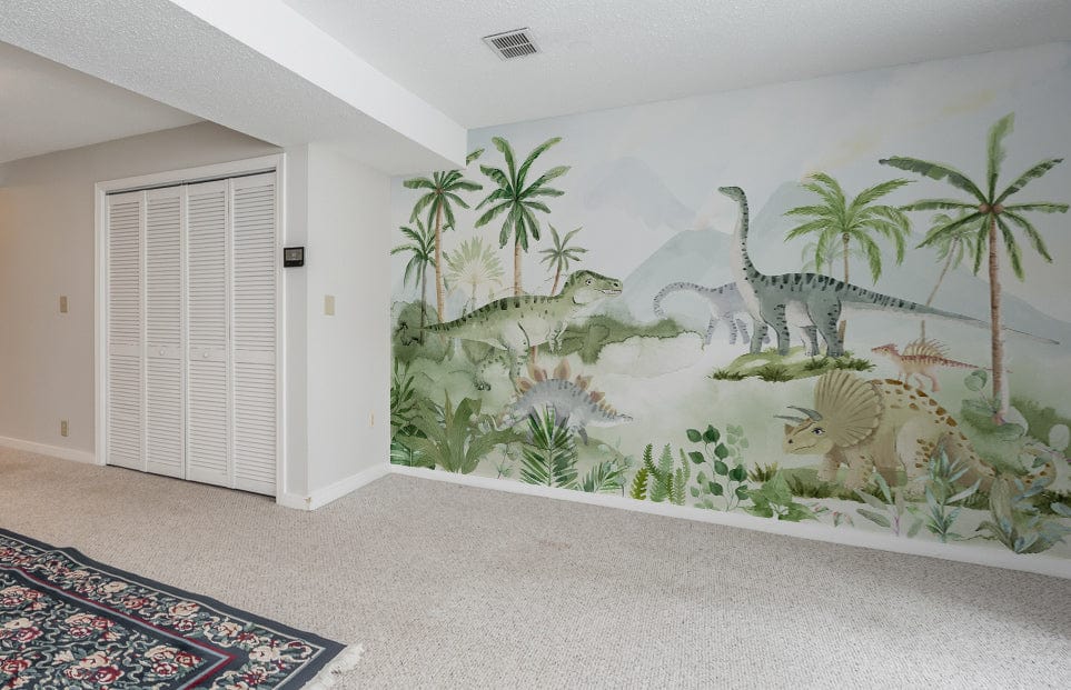 Kids' room with green dinosaur mural wallpaper, beige carpet, white walls, and an ornate rug.