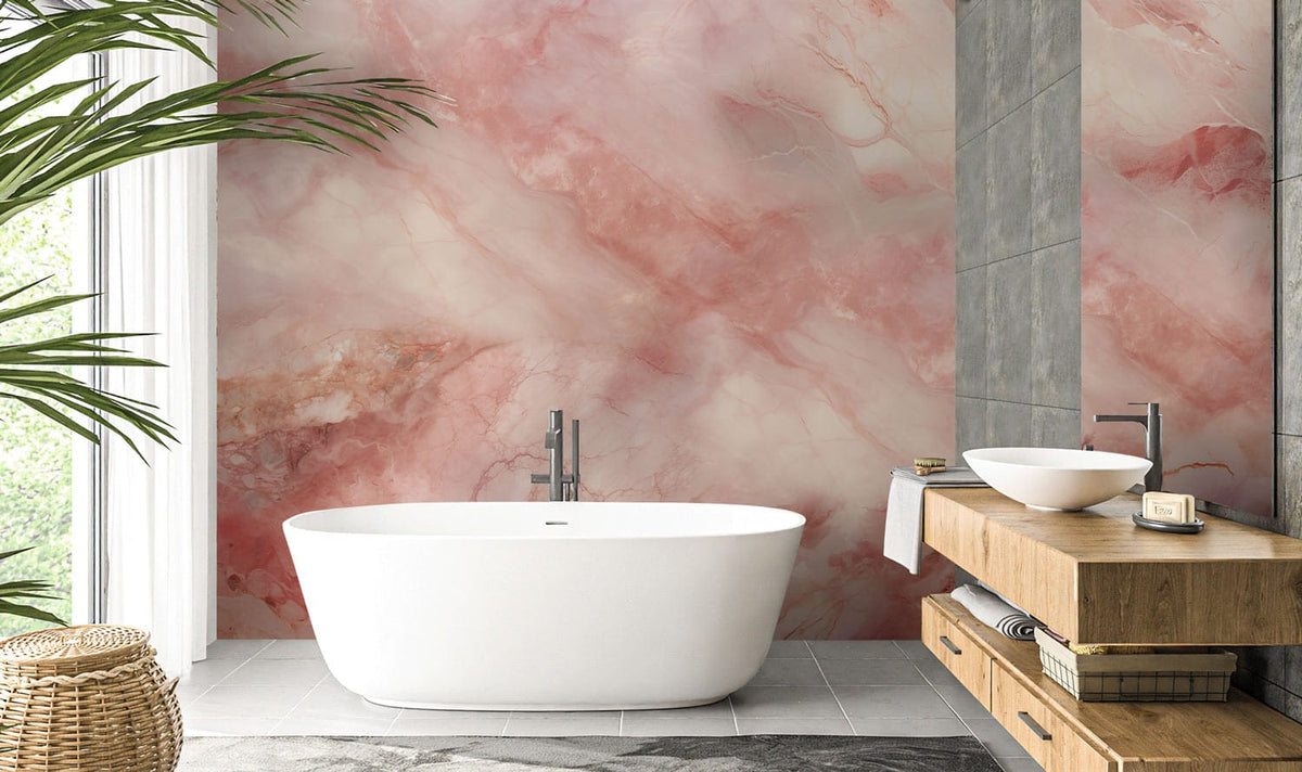 Elegant pink marble effect wallpaper in modern bathroom, featuring white bathtub and wooden vanity unit.
