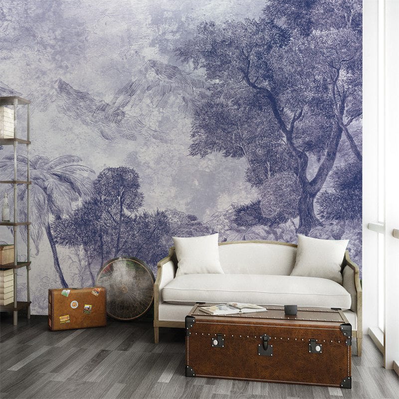 Vintage Blue Forest Mural Wallpaper in cosy living room with cream sofa, wooden flooring, and trunk table.