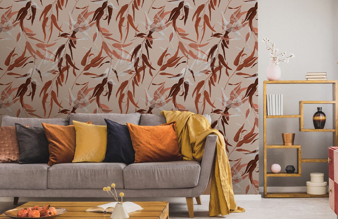 Elegant wallpaper with autumn leaf pattern, beige wall, grey sofa, cosy living room, wood flooring.