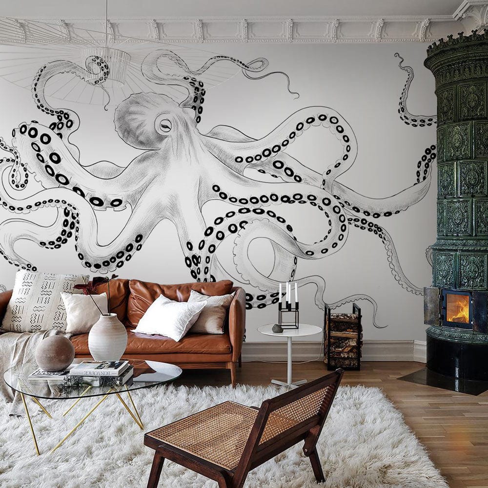 Monochrome Ink Octopus Mural wallpaper in cosy living room with brown sofa, green stove, fluffy rug.