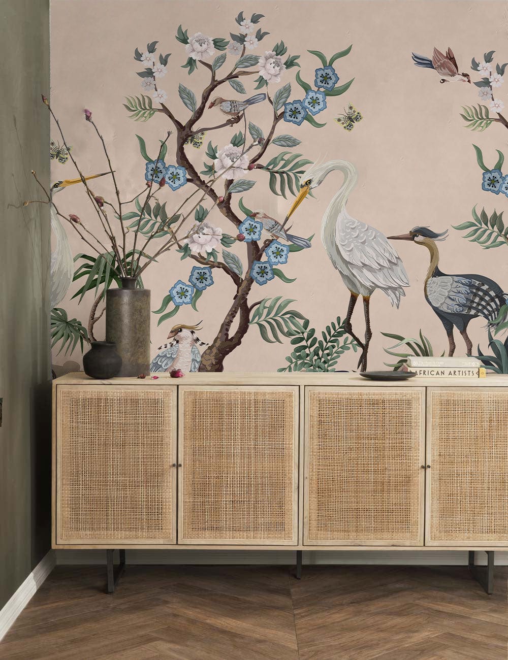 Elegant Heron Mural Wallpaper, pastel hues, woven sideboard, neutral flooring, tranquil living room atmosphere.