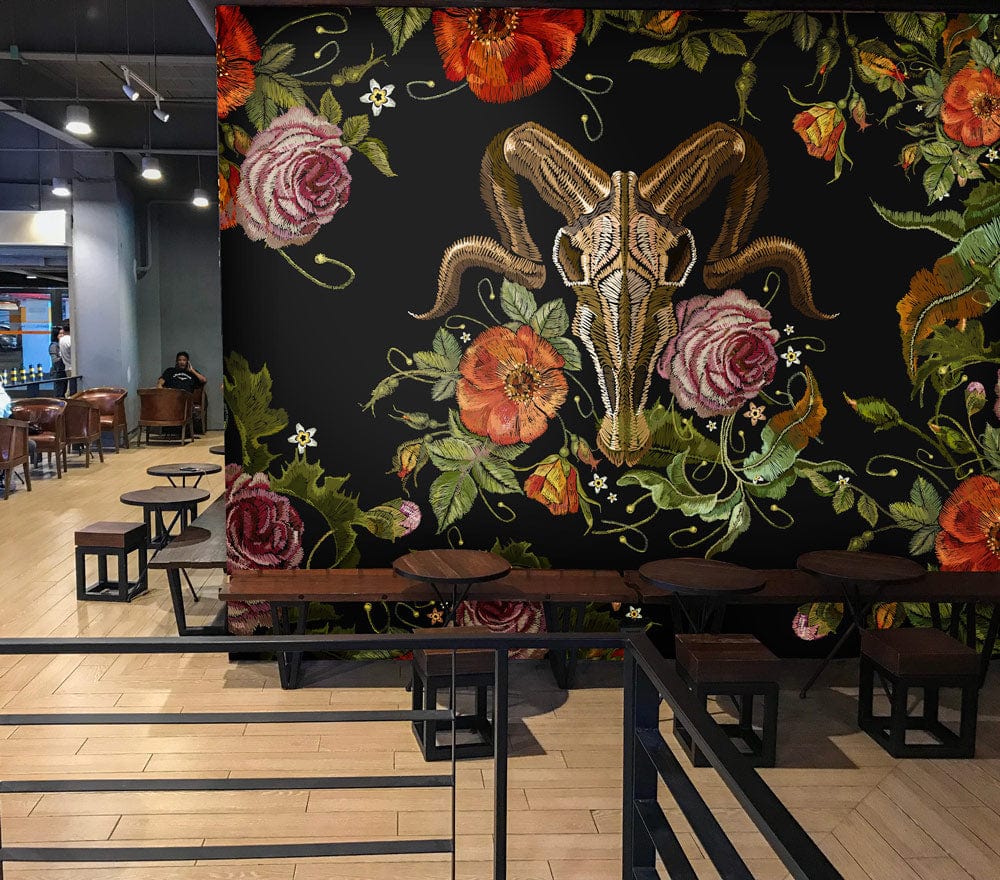 Dark Floral Gothic Skull Wallpaper with roses in a café setting, wooden floor, metal tables.
