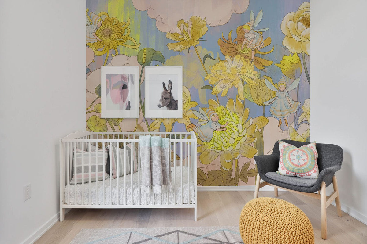 Golden Floral Bliss Mural Wallpaper in nursery; pastel floral design, white cot, grey chair, wooden floor.