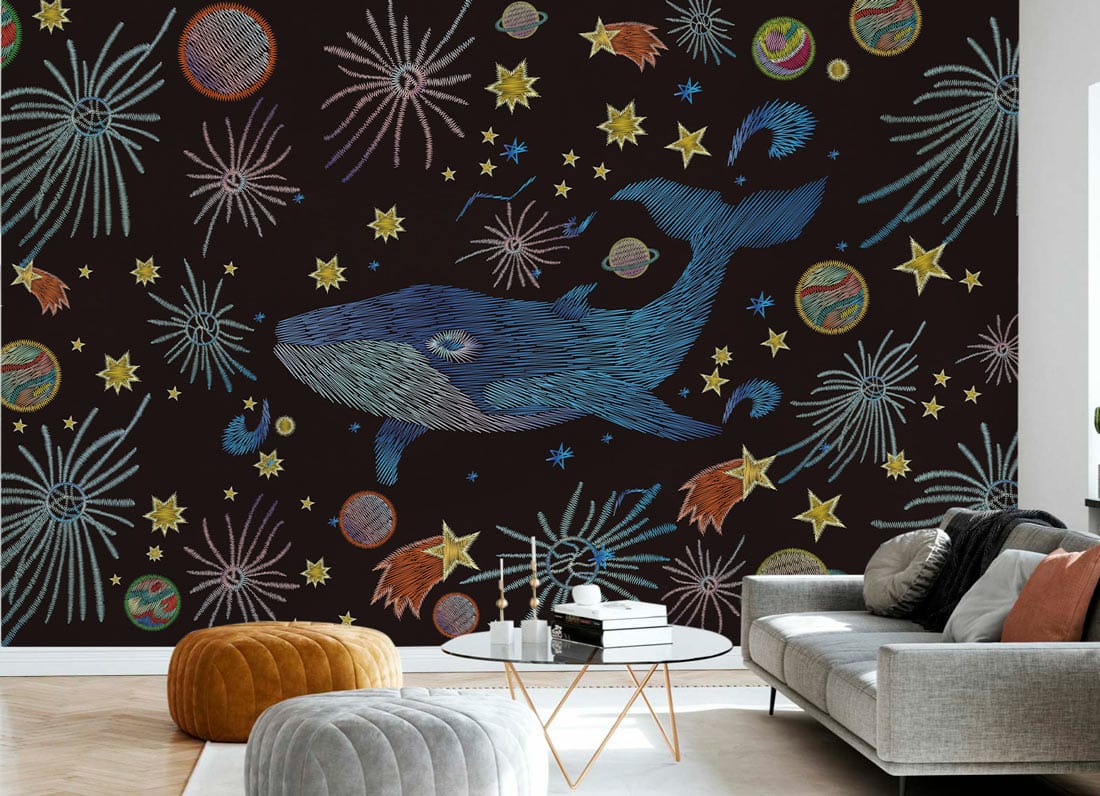 Cosmic Whale Adventure Mural Wallpaper with planets, embroidered design; beige sofa; contemporary living room.