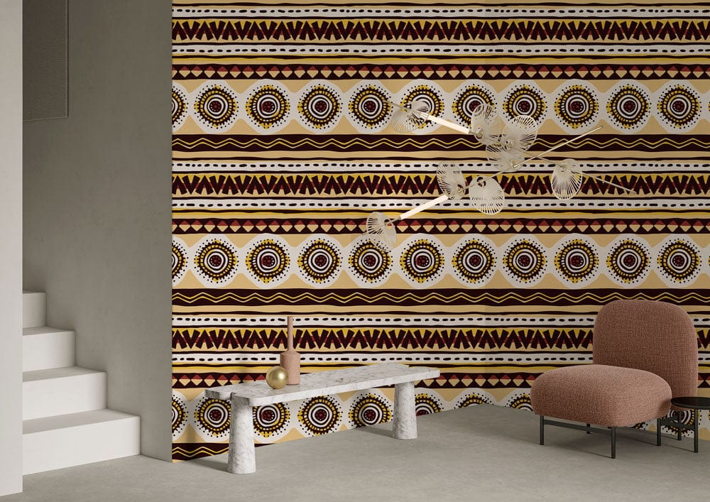 Tribal geometric wallpaper mural in brown and cream, featuring ethnic patterns, armchair, and minimalist decor.