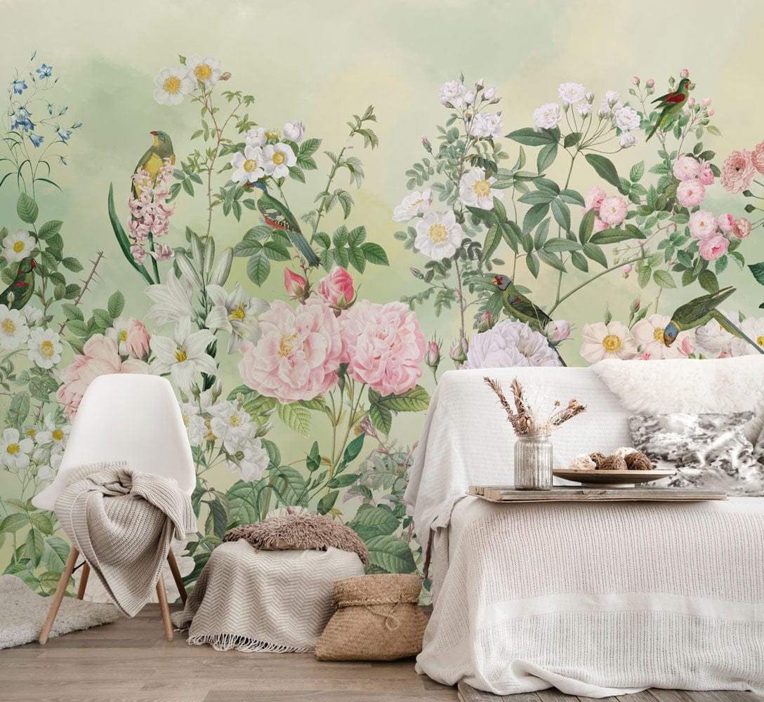 Elegant pastel floral wallpaper with birds; vintage style; alongside white chair, grey sofa in living room.