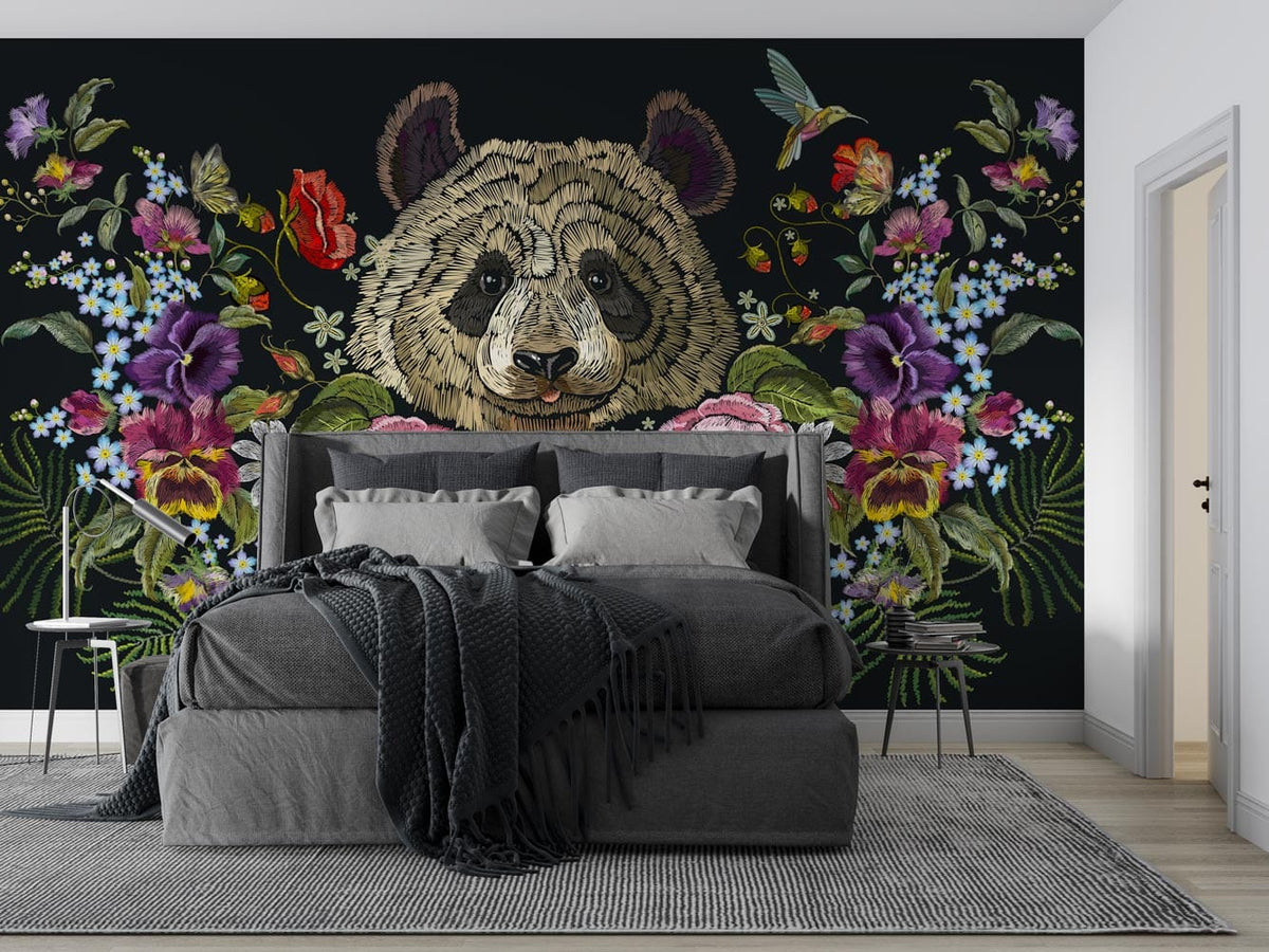 Colourful panda floral mural wallpaper in bedroom with grey bed, striped rug, and vibrant blooms.