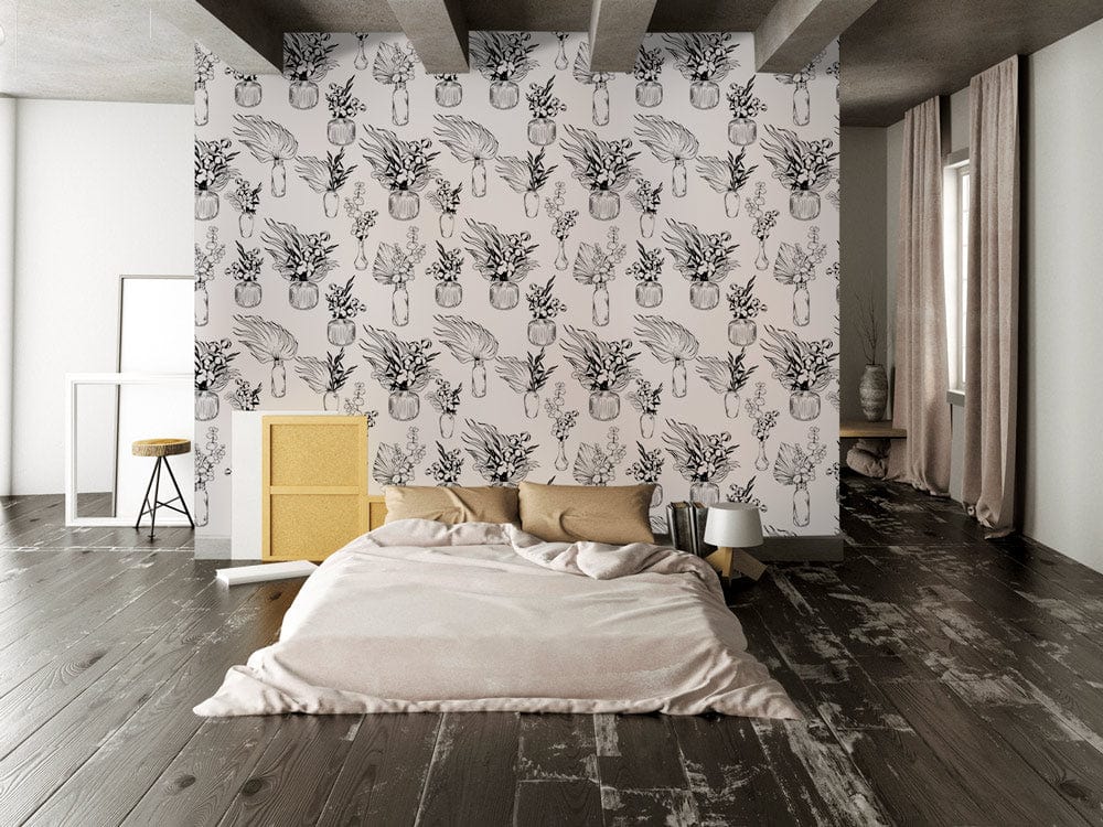 Monochrome botanical vase wallpaper in stylish bedroom with beige bedding, dark wood flooring, and grey ceiling.